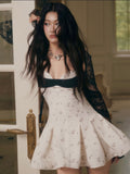 Jirene Studio Black Bow Floral Mini Dress | MALIBU DRESS